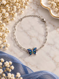 Bracelet papillon bleu à chaîne argentée